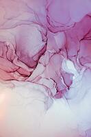 Abstract created using the technique of Alcohol ink. Macro photography of the smallest details of a panting. The panting shows how overflows of shades and colors of paint resemble space motifs. photo