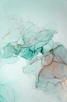 Abstract created using the technique of Alcohol ink. Macro photography of the smallest details of a panting. The panting shows how overflows of shades and colors of paint resemble space motifs. photo