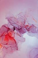 Abstract created using the technique of Alcohol ink. Macro photography of the smallest details of a panting. The panting shows how overflows of shades and colors of paint resemble space motifs. photo