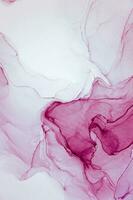 Abstract created using the technique of Alcohol ink. Macro photography of the smallest details of a panting. The panting shows how overflows of shades and colors of paint resemble space motifs. photo