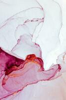 Abstract created using the technique of Alcohol ink. Macro photography of the smallest details of a panting. The panting shows how overflows of shades and colors of paint resemble space motifs. photo
