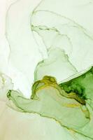 Abstract created using the technique of Alcohol ink. Macro photography of the smallest details of a panting. The panting shows how overflows of shades and colors of paint resemble space motifs. photo