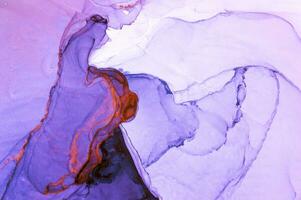 Abstract created using the technique of Alcohol ink. Macro photography of the smallest details of a panting. The panting shows how overflows of shades and colors of paint resemble space motifs. photo