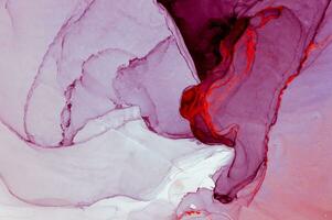 Abstract created using the technique of Alcohol ink. Macro photography of the smallest details of a panting. The panting shows how overflows of shades and colors of paint resemble space motifs. photo