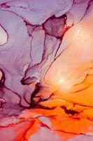 Abstract created using the technique of Alcohol ink. Macro photography of the smallest details of a panting. The panting shows how overflows of shades and colors of paint resemble space motifs. photo