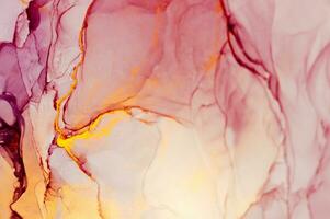 Abstract created using the technique of Alcohol ink. Macro photography of the smallest details of a panting. The panting shows how overflows of shades and colors of paint resemble space motifs. photo