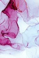Abstract created using the technique of Alcohol ink. Macro photography of the smallest details of a panting. The panting shows how overflows of shades and colors of paint resemble space motifs. photo