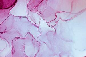 Abstract created using the technique of Alcohol ink. Macro photography of the smallest details of a panting. The panting shows how overflows of shades and colors of paint resemble space motifs. photo
