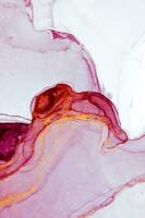 Abstract created using the technique of Alcohol ink. Macro photography of the smallest details of a panting. The panting shows how overflows of shades and colors of paint resemble space motifs. photo