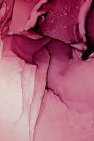 Abstract created using the technique of Alcohol ink. Macro photography of the smallest details of a panting. The panting shows how overflows of shades and colors of paint resemble space motifs. photo