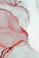 Abstract created using the technique of Alcohol ink. Macro photography of the smallest details of a panting. The panting shows how overflows of shades and colors of paint resemble space motifs. photo