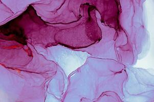 The picture is painted in alcohol ink. Creative abstract artwork made with translucent ink colors. Trendy wallpaper. Abstract painting, can be used as a background for wallpapers, posters, websites. photo