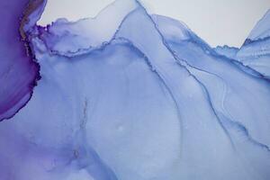 Painting created with alcohol ink. Soft smooth color transitions combined with clear gold and silver edges. Blue, pink, green abstract color combination. photo