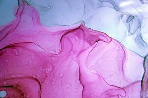 Ink colors are amazingly bright, luminous, translucent, free-flowing, and dry quickly. Abstract artwork. Trendy wallpaper. Natural pattern, luxury. Art for your design project. Transparent creativity. photo