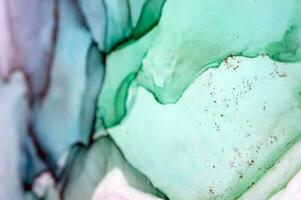 Artistic background that applicable for design cover, poster, brochure. Modern art. Marble texture. Natural pattern. Ink colors are amazingly bright. Alcohol ink sea texture. Contemporary art. photo