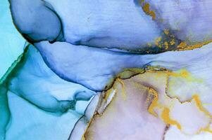 Alcohol ink wash texture on white paper background. Liquid paint flow. Transparent ethereal effect. Closeup of the painting. Highly-textured colorful abstract painting background. photo