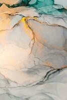 Abstract created using the technique of Alcohol ink. Macro photography of the smallest details of a panting. The panting shows how overflows of shades and colors of paint resemble space motifs. photo