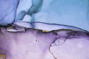 Painting created with alcohol ink. Soft smooth color transitions combined with clear gold and silver edges. Blue, pink, green abstract color combination. photo