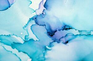 Alcohol ink. Style incorporates the swirls of marble or the ripples of agate. Abstract painting, can be used as a trendy background for wallpapers, posters, cards, invitations, websites. photo