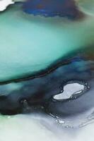 Alcohol ink sea texture. Contemporary art. Spots of oil paint. Abstract art background. Multicolored bright texture. Fragment of artwork. Modern art. Inspired by the sky, as well as steam and smoke. photo