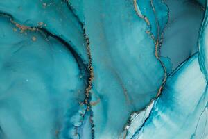 Painting created with alcohol ink. Soft smooth color transitions combined with clear gold and silver edges. Blue, pink, green abstract color combination. photo
