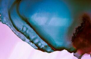 Alcohol ink sea texture. Contemporary art. Spots of oil paint. Abstract art background. Multicolored bright texture. Fragment of artwork. Modern art. Inspired by the sky, as well as steam and smoke. photo