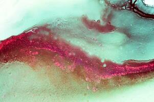 Alcohol ink sea texture. Contemporary art. Spots of oil paint. Abstract art background. Multicolored bright texture. Fragment of artwork. Modern art. Inspired by the sky, as well as steam and smoke. photo