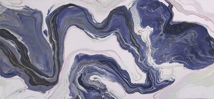 Abstract created using the technique of liquid acrylic. Macro photography of the smallest details of a picture. The picture shows how overflows of shades and colors of paint resemble space motifs. photo