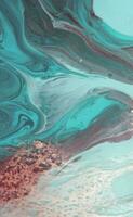 Abstract created using the technique of liquid acrylic. Macro photography of the smallest details of a panting. The panting shows how overflows of shades and colors of paint resemble space motifs. photo
