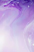 Abstract created using the technique of liquid acrylic. Macro photography of the smallest details of a panting. The panting shows how overflows of shades and colors of paint resemble space motifs. photo
