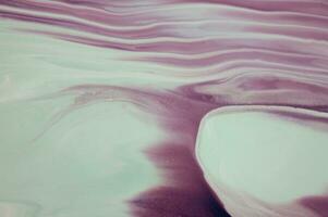 Closeup of the painting. Colorful abstract painting background. Highly-textured oil paint. High quality details. Marbling. Marble texture. Paint splash. Colorful fluid. photo