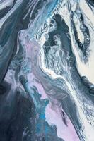 Abstract created using the technique of liquid acrylic. Macro photography of the smallest details of a picture. The picture shows how overflows of shades and colors of paint resemble space motifs. photo