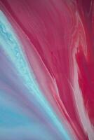 Abstract created using the technique of liquid acrylic. Macro photography of the smallest details of a panting. The panting shows how overflows of shades and colors of paint resemble space motifs. photo