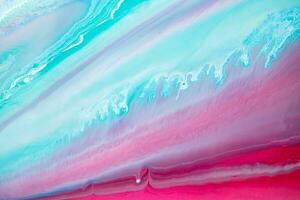 Abstract created using the technique of liquid acrylic. Macro photography of the smallest details of a panting. The panting shows how overflows of shades and colors of paint resemble space motifs. photo