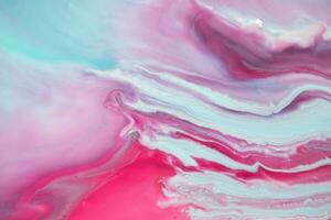 Abstract created using the technique of liquid acrylic. Macro photography of the smallest details of a panting. The panting shows how overflows of shades and colors of paint resemble space motifs. photo