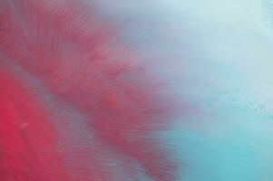 Abstract created using the technique of liquid acrylic. Macro photography of the smallest details of a panting. The panting shows how overflows of shades and colors of paint resemble space motifs. photo