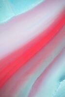 Abstract created using the technique of liquid acrylic. Macro photography of the smallest details of a panting. The panting shows how overflows of shades and colors of paint resemble space motifs. photo