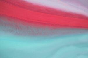 Abstract created using the technique of liquid acrylic. Macro photography of the smallest details of a panting. The panting shows how overflows of shades and colors of paint resemble space motifs. photo