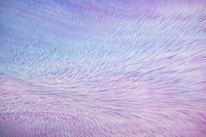 Abstract created using the technique of liquid acrylic. Macro photography of the smallest details of a picture. The picture shows how overflows of shades and colors of paint resemble space motifs. photo