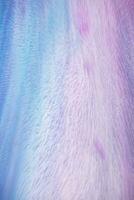 Abstract created using the technique of liquid acrylic. Macro photography of the smallest details of a picture. The picture shows how overflows of shades and colors of paint resemble space motifs. photo
