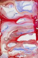 Abstract created using the technique of liquid acrylic. Macro photography of the smallest details of a picture. The picture shows how overflows of shades and colors of paint resemble space motifs. photo