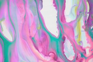 Abstract created using the technique of liquid acrylic. Macro photography of the smallest details of a picture. The picture shows how overflows of shades and colors of paint resemble space motifs. photo