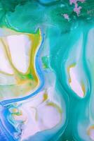 Abstract created using the technique of liquid acrylic. Macro photography of the smallest details of a picture. The picture shows how overflows of shades and colors of paint resemble space motifs. photo