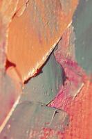 Multicolored texture painting. Abstract art background. oil on canvas. Rough brushstrokes of paint. Closeup of a painting by oil and palette knife. Highly-textured, high quality details. photo