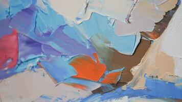 Fragment. Multicolored texture painting. Abstract art background. oil on canvas. Rough brushstrokes of paint. Closeup of a painting by oil and palette knife. Highly-textured, high quality details. photo