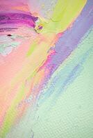 Oil painting in multicolored tones. Conceptual abstract closeup of a painting by oil and palette knife on canvas. photo