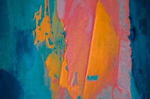 Multicolored texture painting. Abstract art background. oil on canvas. Rough brushstrokes of paint. Closeup of a painting by oil and palette knife. Highly-textured, high quality details. photo