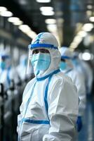 Sanitization process in a hospital PPE clad staff background with empty space for text photo