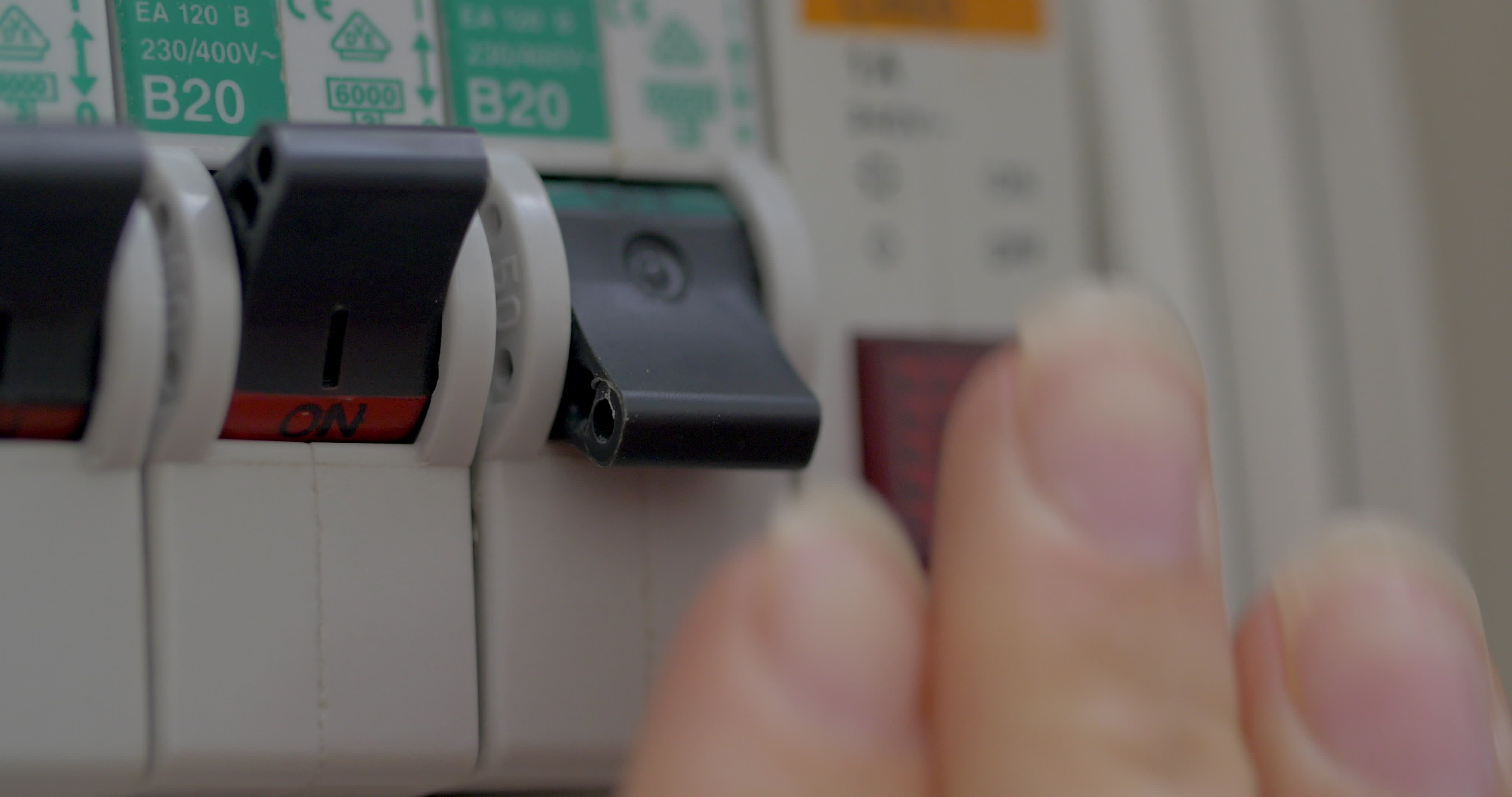 Turning on water heater on power panel 29130058 Stock Video at Vecteezy