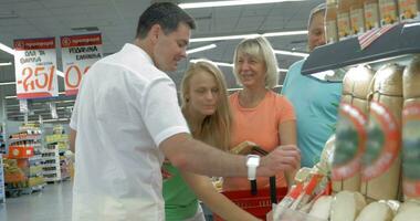 People by the Supermarket Shelf video